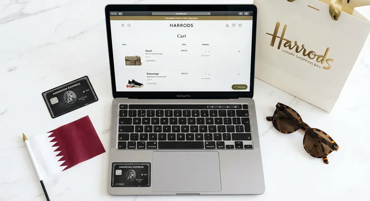 Online shopping experience in Qatar showing e-commerce website on laptop with luxury products